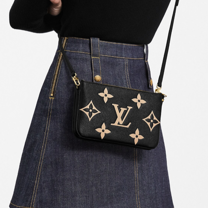 Louis Vuitton Cartera de mano Double Zip